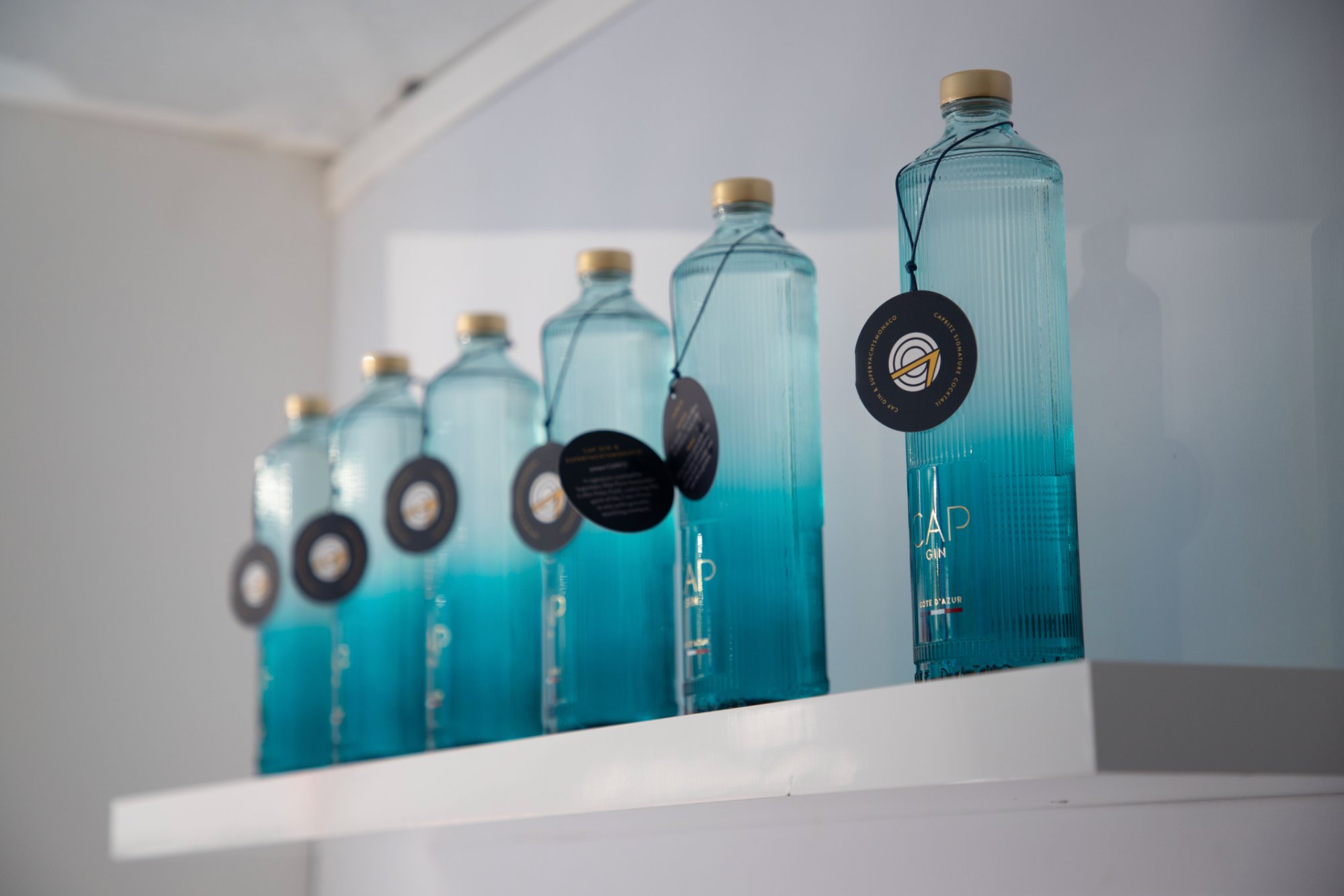 CAP Gin Côte d'Azur bottles on display at Monaco Yacht Show stand