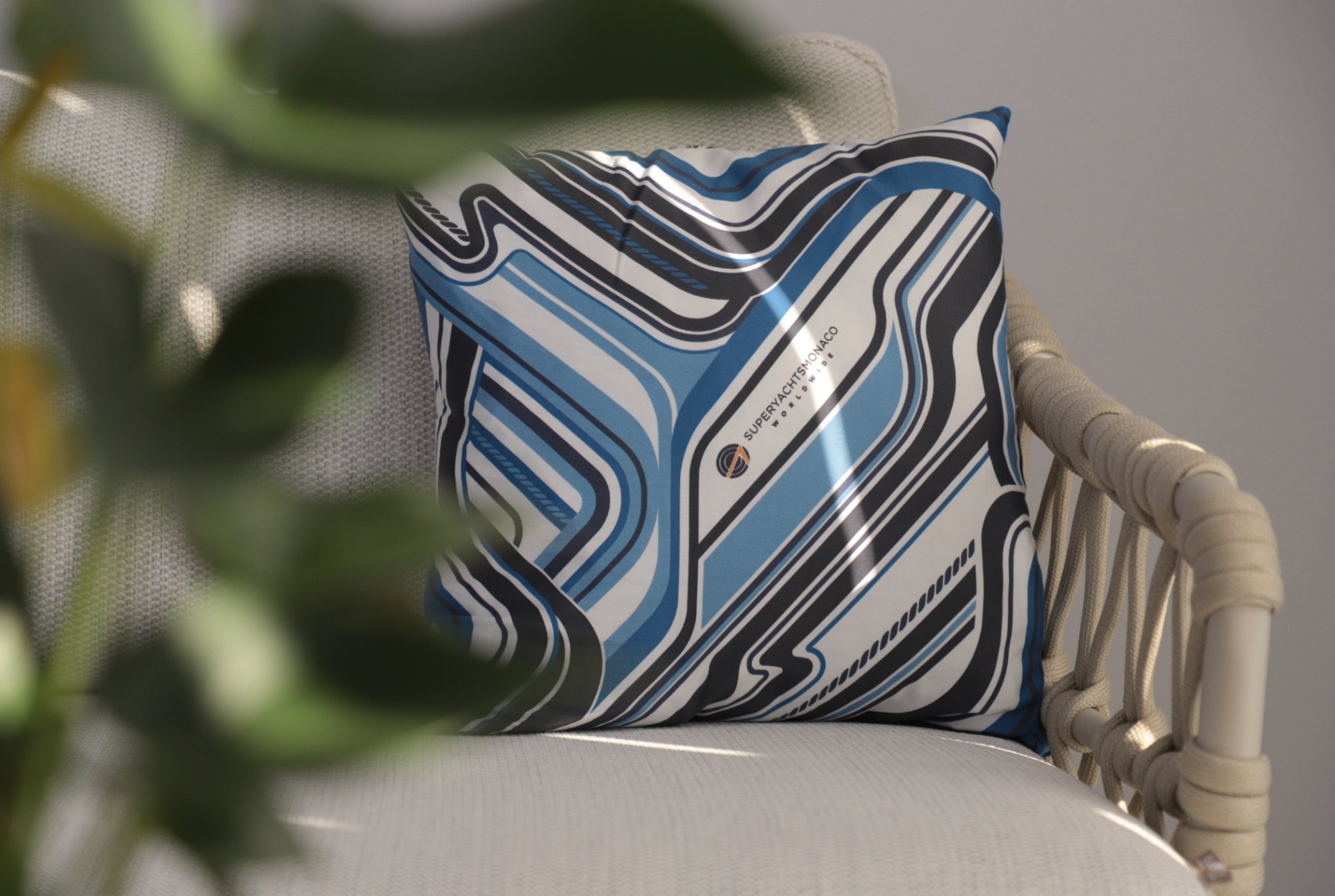 SuperYachtsMonaco branded cushion — Jason Brooks pattern on stand seating